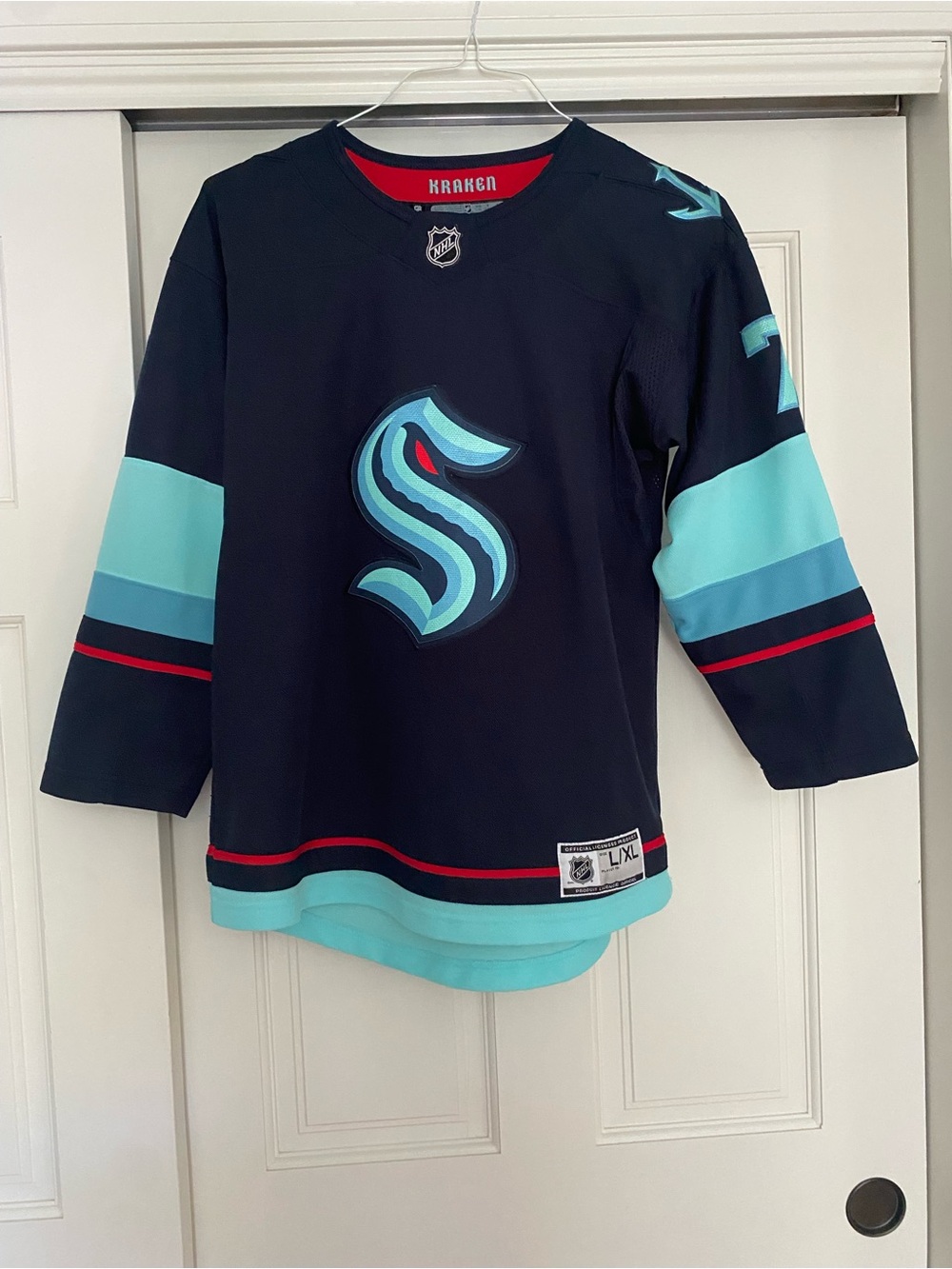 NHL Seattle Kraken Youth Eberle Navy Jersey with Teal and Red Accents
